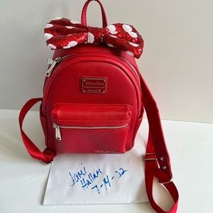 Loungefly backpack. Brand new. Smoke and pet free home. Minnie Mouse sequined